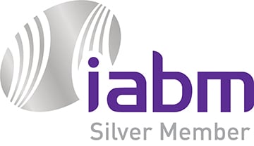 Silver icon next to purple IABM Silver Member Logo